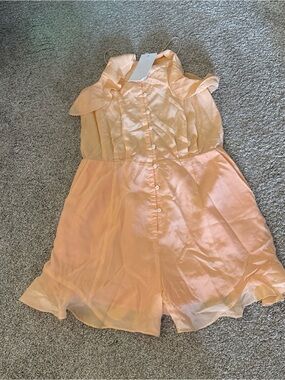Soft Peach Button-Front Ruffle Romper